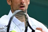 Le Serbe Novak Djokovic face au Hongrois Marton Fucsovics en quart de finale de Wimbledon, le 7 juillet 2021