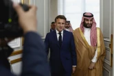 Le président français Emmanuel Macron et le prince héritier saoudien Mohammed ben Salmane à l'Elysée pour un dîner de travail, le 28 juillet 2022 à Paris