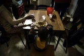 Une mère et son enfant dans les locaux de l'association Solidarité Notre-Dame de Tanger à Paris le 17 décembre 2018