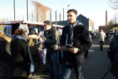 Un militant de "La France insoumise" de Mélenchon tracte le 15 février 2015 à Roubaix 