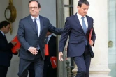 Le président François Hollande et le Premier ministre Manuel Valls à l'issue du conseil de défense le 11 août 2016 à l'Elysée à Paris