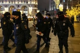 Arrestation d'un manifestant en faveur de l'opposant russe Alexei Navalny, pendant un rassemblement devant le siège des services de sécurité russes (FSB) à Moscou le 21 décembre 2020