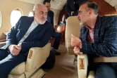 Javad Zarif (à gauche) s'entretient avec l'universitaire Massoud Soleimani après sa libération par les Etats-Unis, le 7 décembre 2019, dans une photo publiée par le ministère iranien des Affaires étrangères 