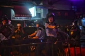 Des policiers face aux manifestants à Hong Kong, le 25 août 2019
