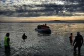 Des migrants arrivent de Turquie à Mytilene sur l'île de Lesbos le 23 février 2016