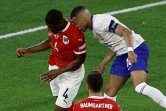 Le capitaine de l'équipe de France Kylian Mbappe (en blanc) dans un choc nez contre épaule avec le défenseur autrichien Kevin Danso, lors de la victoire des Bleus 1-0 dans leur match de l'Euro-2024, lundi 17 juin dans la Dusseldorf Arena de Dusseldorf