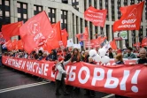 Des militants du Parti communiste russe défilent à Moscou le 17 août 2019 contre l'exclusion de dizaines de candidats aux élections locales de septembre.
