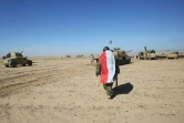 Des blindés des forces irakiennes se préparent à aller vers le village de Sheikh Younis, au sud de Mossoul, le 19 février 2017