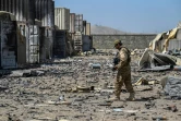 Un membre de la "Badri 313", unité d'élite des talibans, parmi les débris de lex-base de la CIA près de Kaboul dans le district de Deh Sabz, le 6 septembre 2021