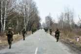 Photo diffusée le 21 février 2022 par le service de presse de l'armée ukrainienne de soldats ukrainiens s'entraînant dans un lieu non précisé