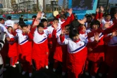 Les athlètes nord-coréens lors d'une cérémonie d'accueil au village olympique, le 8 février 2018 à Pyeongchang, en Corée du Sud