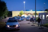 Des policiers devant le centre d'enregistrement des réfugiés à Hambourg en Allemagne, le 1er octobre 2015