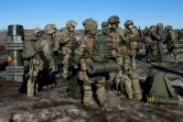 Des soldats ukrainiens dans un lieu non identifié, dans une photo diffusée par l'armée ukrainienne le 19 février 2022