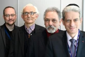 Le pasteur Pierre de Mareuil, le diacre Yves de Brunhoff, l'imam Hazem El Shafei et le rabbin Moché Lewin devant l'espace de prière à l'aéroport Roissy de Paris, le 29 mars 