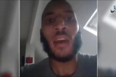 Une capture d'écran d'une vidéo publiée par l'agence Amaq, affiliée au groupe jihadiste Etat islamique, montre Larossi Aballa, tueur d'un couple de policiers à Magnanville, le 13 juin 2016