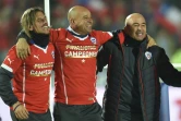 L'entraîneur du Chili Jorge Sampaoli (d) exulte après la victoire face à l'Argentine en finale de la Copa America, le 5 juillet 2015 à Santiago