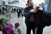 Le docteur Muhamad Alhaj Moustafa, citoyen syrien  accueille sa femme de retour aux Etats-Unis, après un voyage à Doha, le 6 février 2017 à l'aéroport de Dulles en Virginie