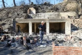 Sebastian Harrison au milieu des ruines calcinées de sa maison après l'incendie de Palisades à Malibu, en Californie, le 21 janvier 2025