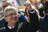 Jean-Luc Mélenchon, candidat de La France insoumise (g) à l'élection présidentielle, lors d'un rassemblement à Paris, le 20 mars 2022  