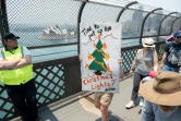 Des manifestants exigent des mesures pour lutter contre le réchauffement climatique, le 21 décembre 2019 à Sydney