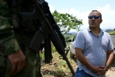 Nelson Enrique Rios, alias Gafas, chef politique du Front Carlos Patino, lors d'une interview avec l'AFP dans le canyon de Micay, dans le département du Cauca, le 24 mars 2024 en Colombie 