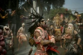Des fidèles hindous enduits de cendres dansent lors d'une procession religieuse avant le festival de la Kumbh Mela à Prayagraj en Inde, le 10 janvier 2025