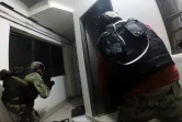 Capture d'écran d'une video fournie le 11 janvier 2016 par la marine mexicaine de l'opération menée  dans la maison où Guzman s'était réfugié à Los Mochis 