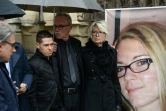 Jonathann Daval et ses beaux-parents près du portrait d'Alexia Daval à Gray, le 8 novembre 2017