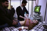 Une fillette est soignée dans un hôpital de fortune à Douma, dans la périphérie est de Damas, le 19 février 2017