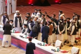 Des représentants des talibans à l'issue d'une séance de pourparlers avec des représentants du gouvernement afghan, le 12 septembre 2020 à Doha, au Qatar