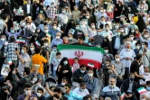 Des partisans du nouveau président iranien élu Ebrahim Raïssa fêtent sa victoire, le 19 juin 2021 à Téhéran