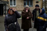 Des femmes en pleurs, le 2 avril 2022 à Boutcha(nord-ouest de Kiev)