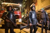 Des forces de sécurité sont déployées sur les lieux d'un attentat, le 21 janvier à Gizeh, en face du Caire, en Egypte