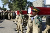 Les funérailles de victimes d'une attaque contre une académie militaire à Homs, le 6 octobre 2023 en Syrie