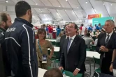 François Hollande avec Florent Manaudou au village olympique le 4 août 2016 à Rio