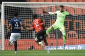 L'attaquant nigérian de Lorient, Terem Moffi (c), marque un but lors du match de Ligue 1 à domicile contre Bordeaux, le 25 avril 2021