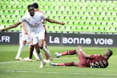 Le milieu de terrain de Nîmes, Lamine Fomba, ouvre le score face à Metz, lors de leur match de L1, le 9 mai 201 au stade Saint-Symphorien à Longeville-lès-Metz