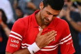 Le Serbe Novak Djokovic ému après sa victoire en finale de Roland-Garros contre le Grec Stefanos Tsitsipas, le 13 juin 2021
