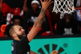 L'arrière français du Magic Evan Fournierau lay-up contre les Toronto Raptors, dans la bulle de isney à Orlando, le 5 août 2020