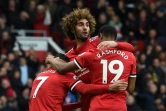 Le milieu de Manchester United, l'international belge Marouane Fellaini, est congratulé après un but contre Arsenal à Old Trafford, le 29 avril 2018