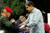 Le président vénézuélien Nicolas Maduro (D) à Caracas le 28 août 2024