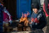 Un enfant kurde dans le camp de migrants de Grande-Synthe, près de Dunkerque, dans le nord de la France, le 23 décembre 2015