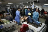 Des blessés sont pris en charge à l'hôpital al-Chifa, à Gaza, après une frappe israélienne, le 25 janvier 2024