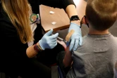 Un enfant reçoit une injection du vaccin Pfizer contre le Covid-10, le 5 novembre 2021 à Southfield, dans le Michigan 
