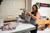 La Colombienne Jackeline Adarve dans son atelier de fabrication de vêtements de sport, le 10 décembre 2020 à Cali