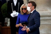 Emmanuel Macron et son épouse Brigitte Macron, au ministère des Armées le 13 juillet 2020, où le président vient de prononcer un discours