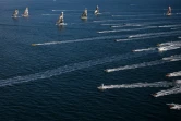 Les six concurrents de l'Ultim Challenge, escortés par d'autres bateaux, lors du départ à Brest, le 7 janvier 2024