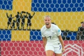 La joie de l'attaquante anglaise Beth Mead, après avoir ouvert le score face à la Suède, lors de leur demi-finale de l'Euro, le 26 juillet 2022 à Sheffield
