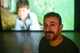 Erkan Özgen, un artiste kurde qui a récemmenet ouvert une nouvelle galerie d'art contemporain à Diyarbakir, pose à Istanbul, le 22 octobre 2017