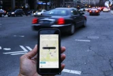 L'application Uber sur un smartphone le 25 mars 2015 à Washington